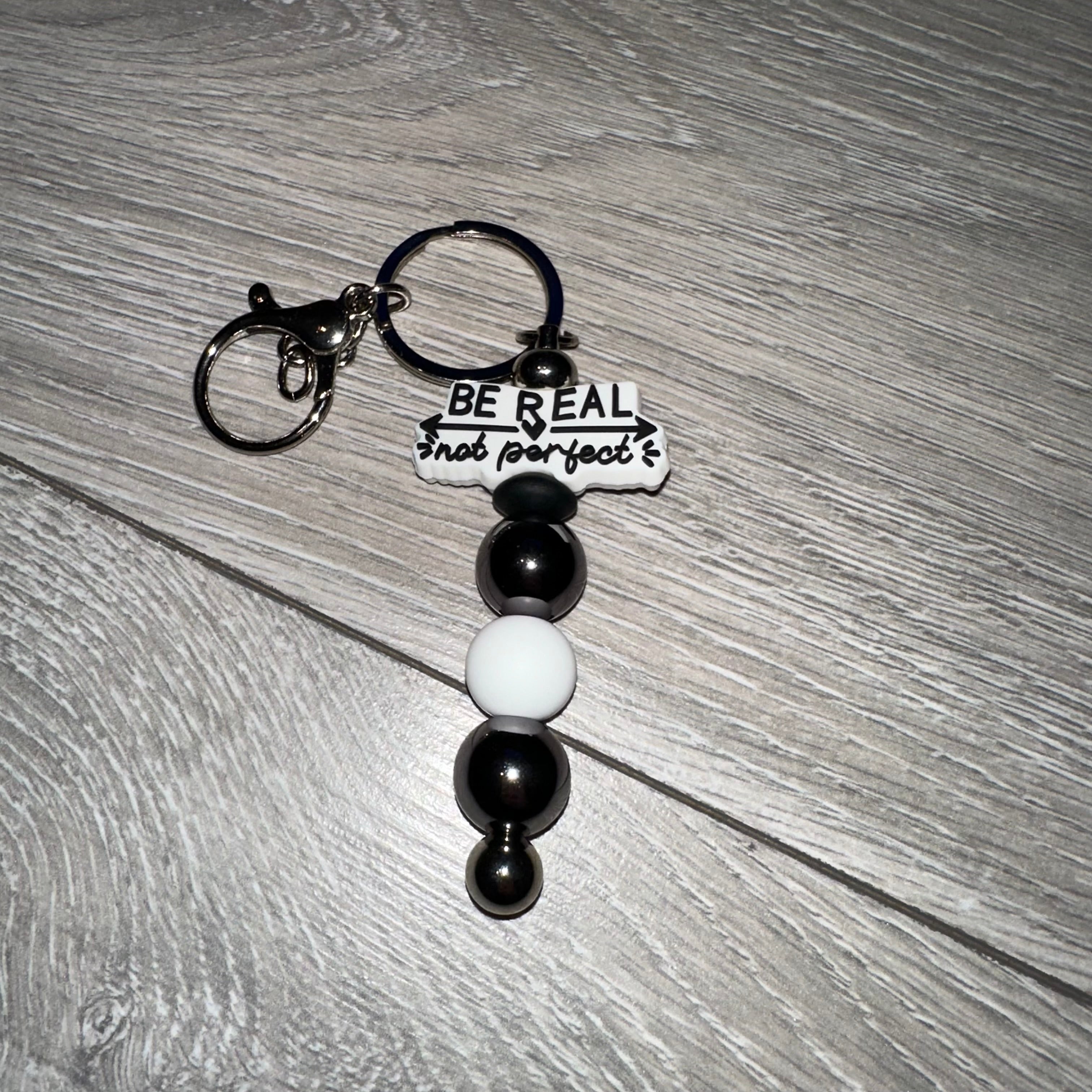 “Be Real Not Perfect” Focal Keyring