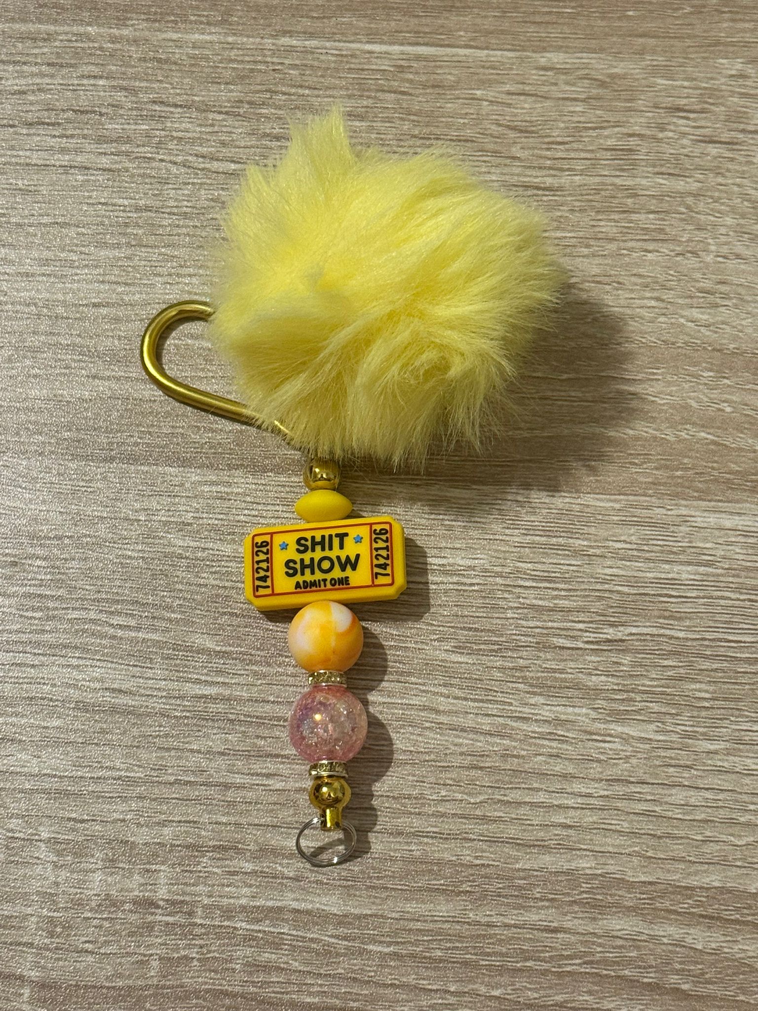 Yellow Pom Pom Keyring with Shit Show Ticket