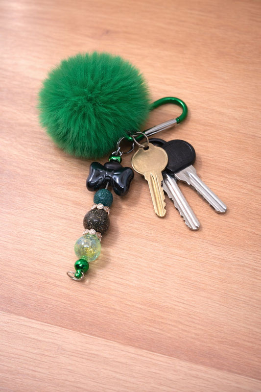 Green Pom Pom Keyring with Black Bow Focal