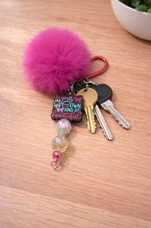 Pink Pom Pom Keyring with Be Your Own Kind of Beautiful Focal