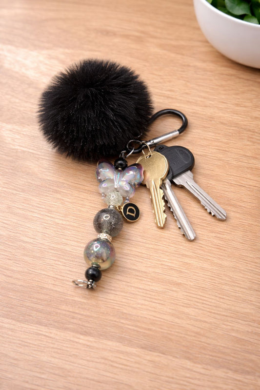 Black Pom Pom Keyring with Black Butterfly Focal